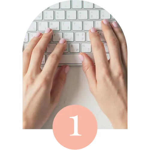 Close-up of hands typing on a keyboard