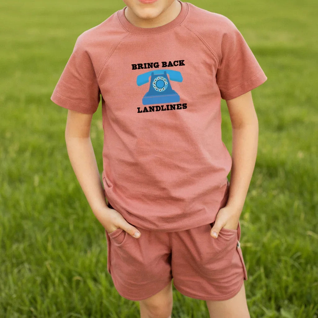 Bring Back Landlines message with vintage phone on rose t-shirt