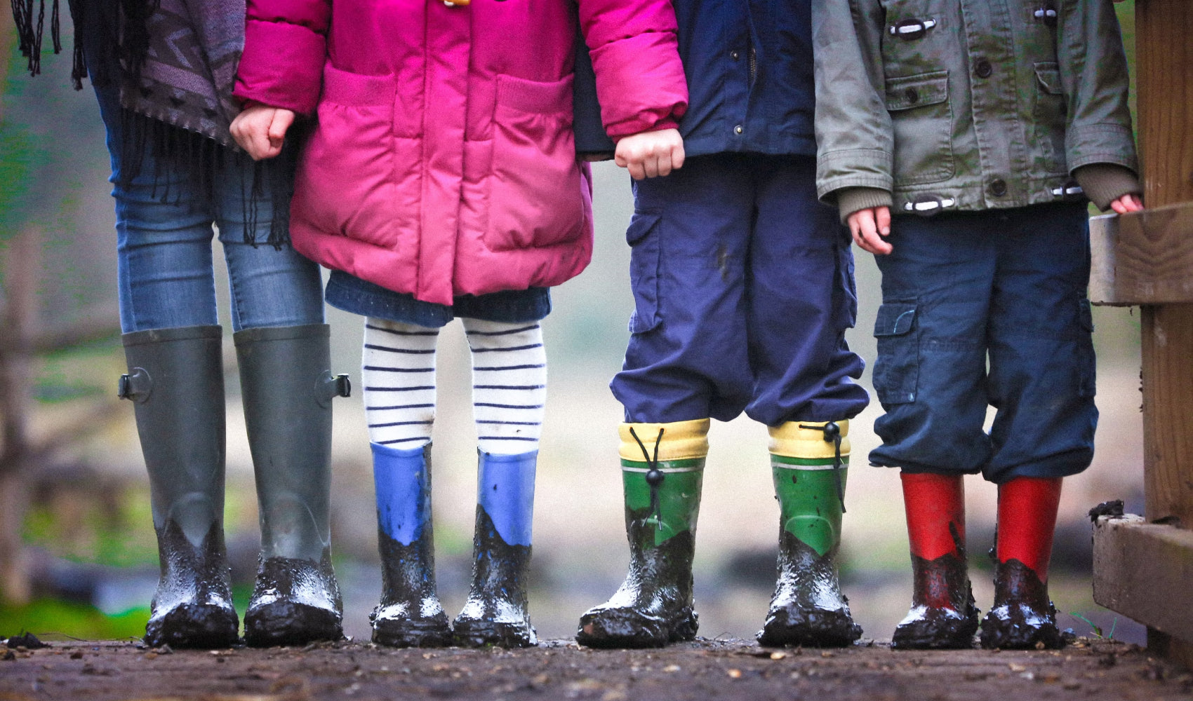 Cropped photo of kids wearing boots