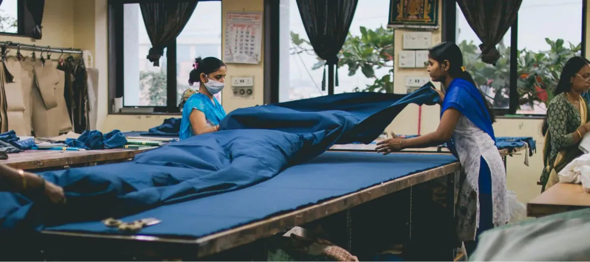 Women working on sewing machine