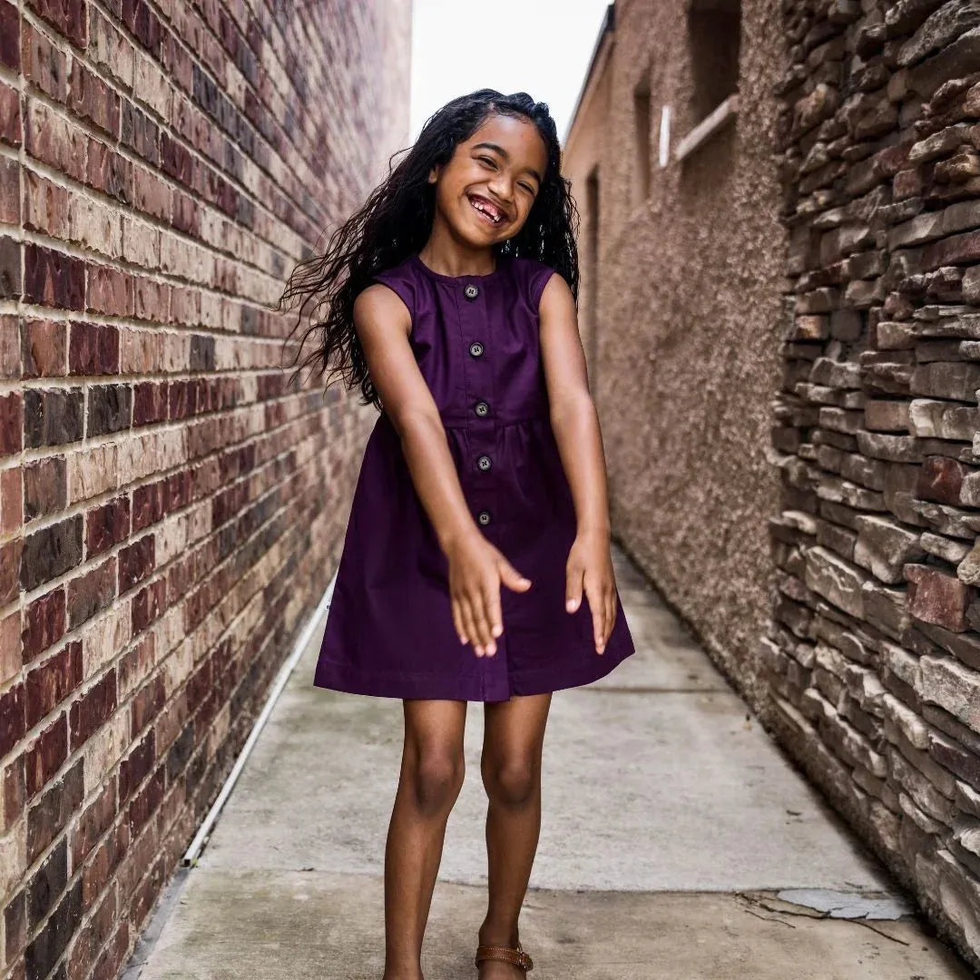 girls smiling in dress