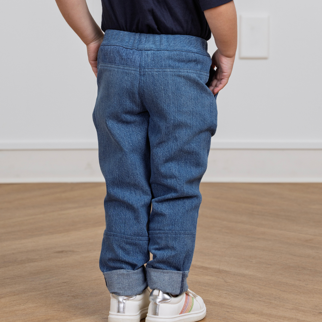 Kids' blue denim joggers with cuffed hems, perfect for active play and comfort.