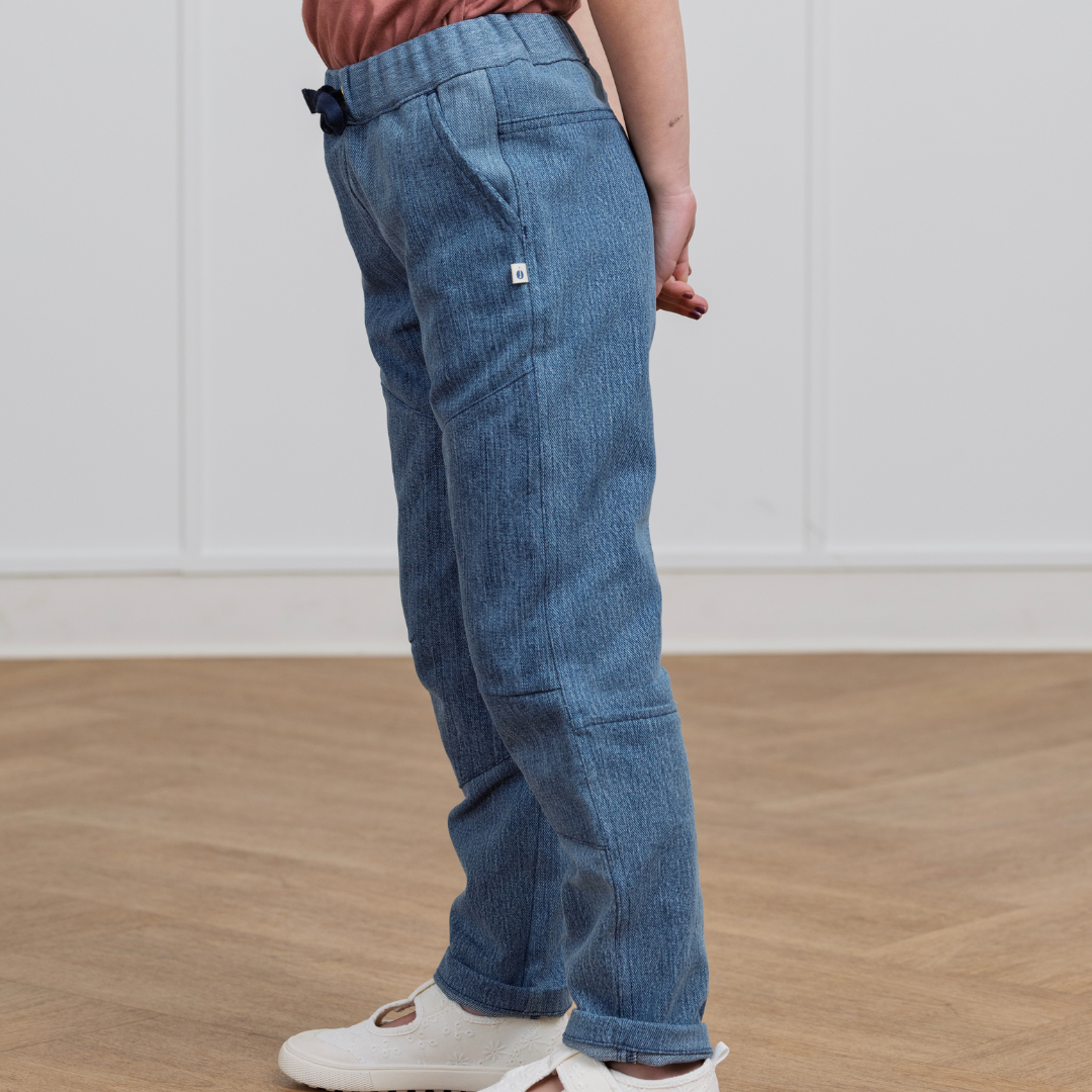 Kids' blue denim-style cargo pants with adjustable waist, rolled cuffs, and side pockets for active play