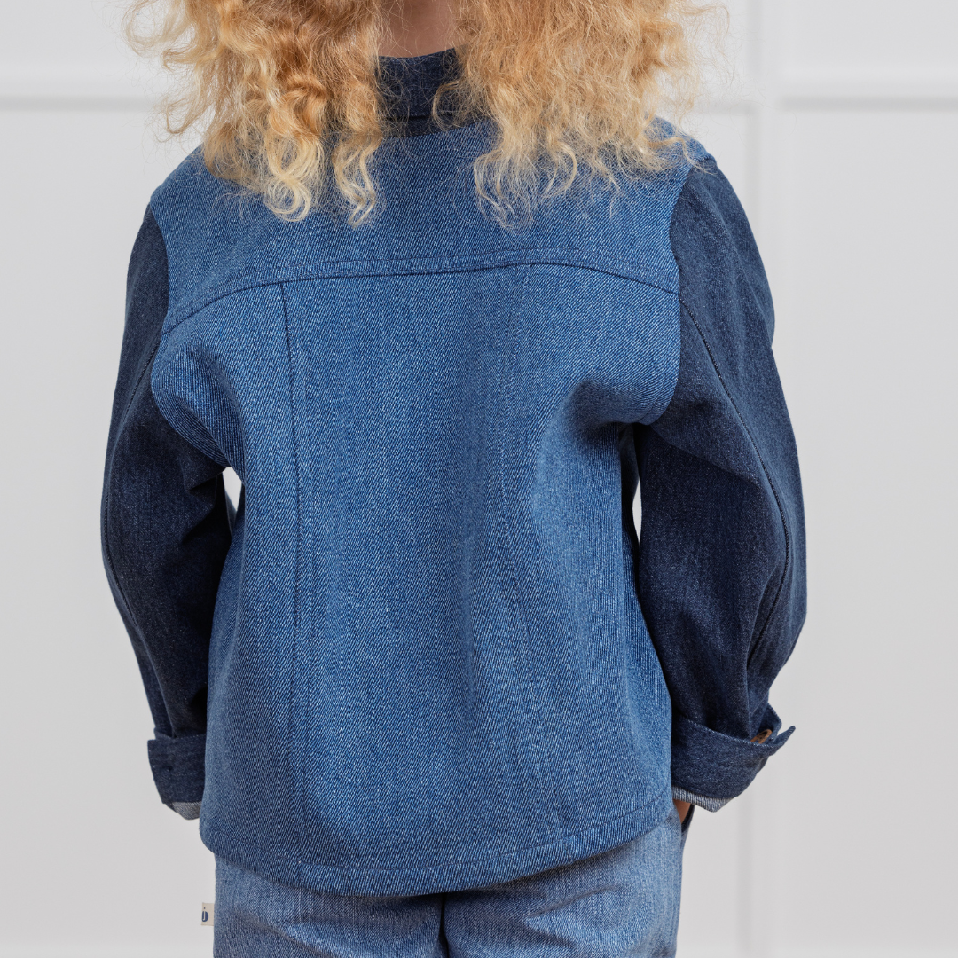 Kids denim jacket with rolled sleeves, durable and comfortable for active play