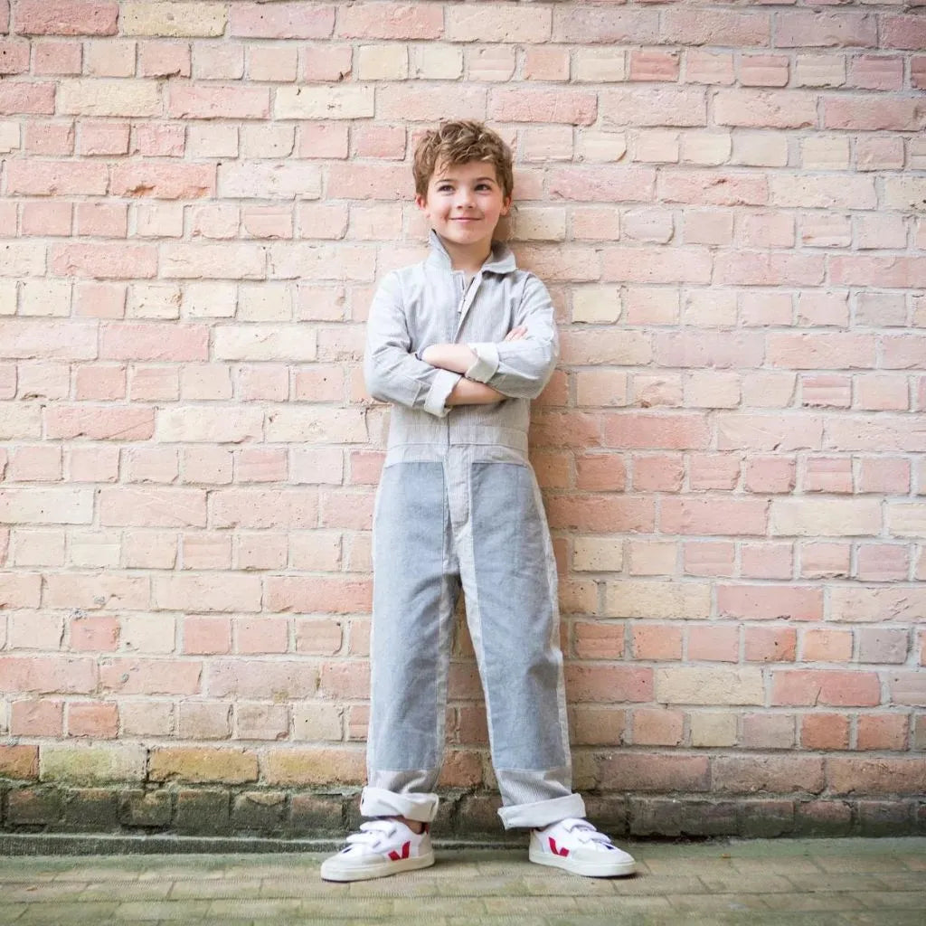 Standing male kid crossed arms