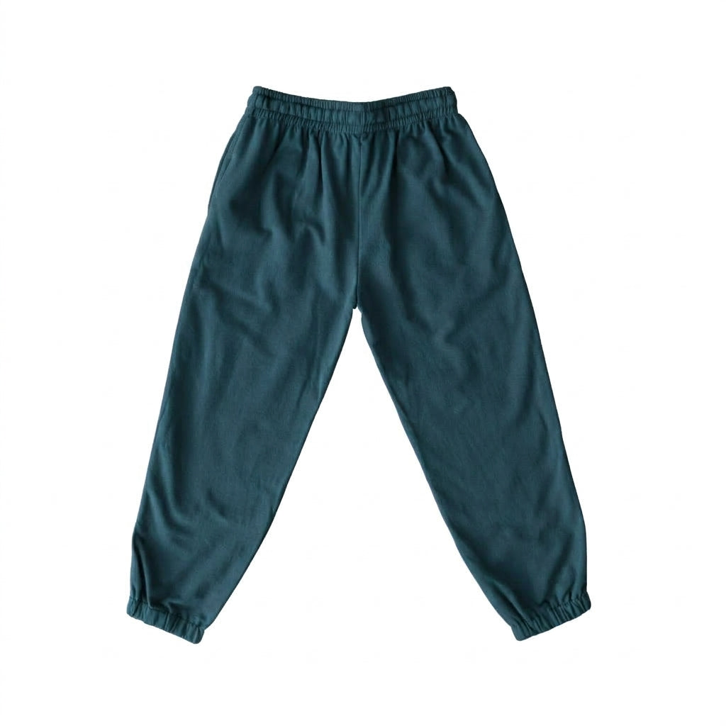 A pair of dark teal green jogger pants with an elastic waistband and elastic cuffs, shown flat against a solid white background.