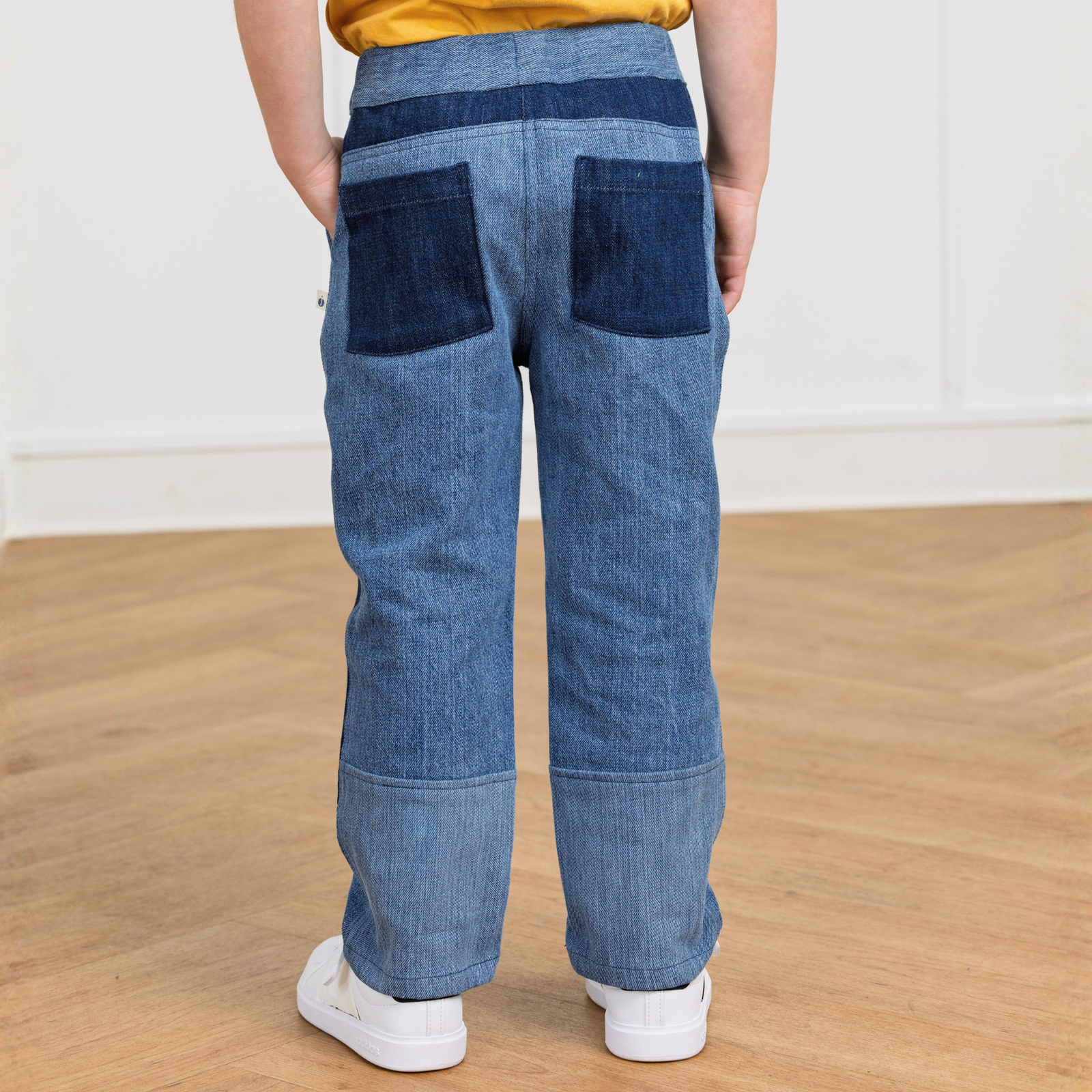 Kids' denim pants with patch pockets, durable and comfortable for active play