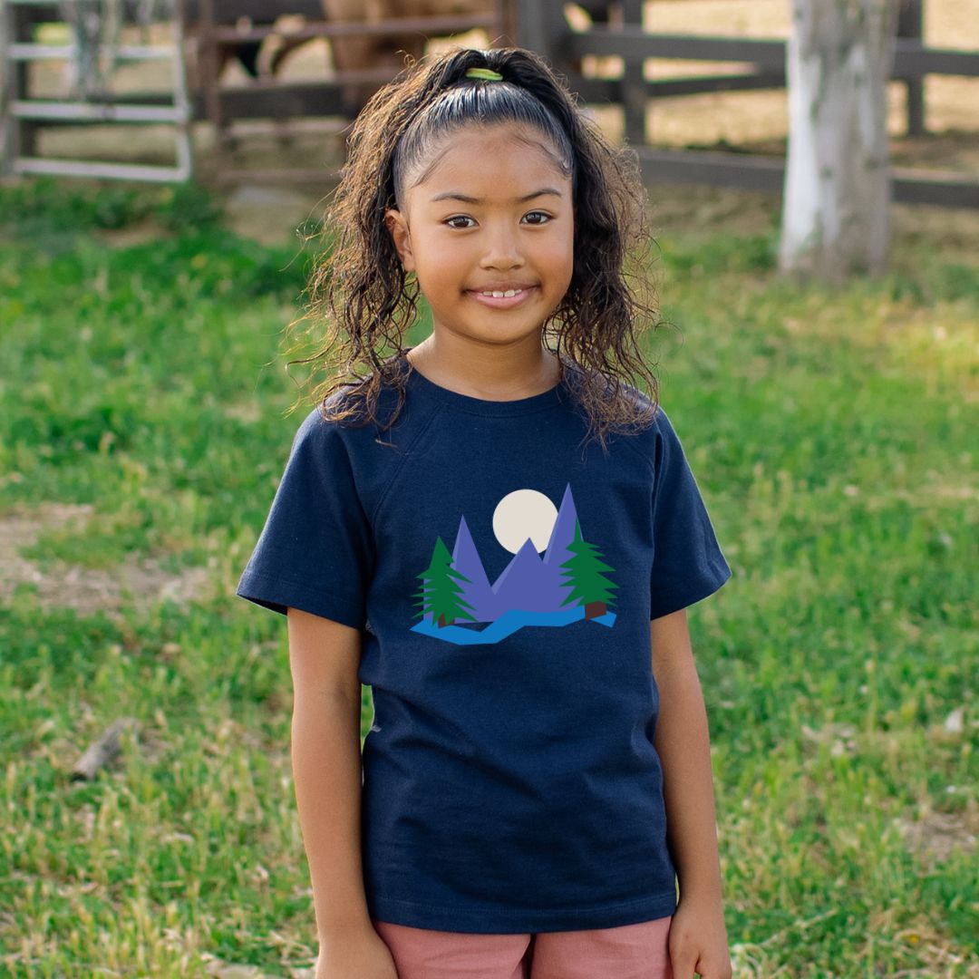 Navy kids t-shirt with mountain, trees, and moon graphic for active outdoor adventures