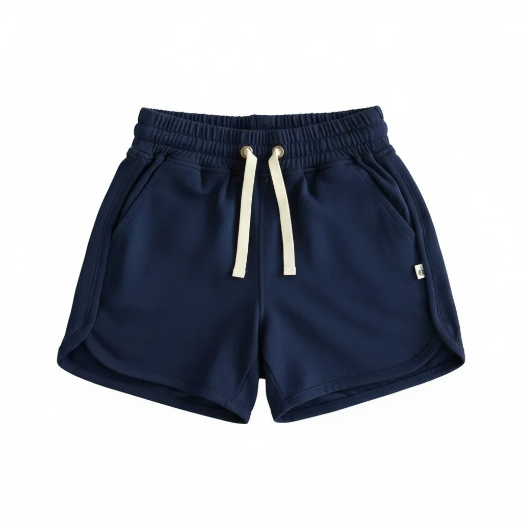Navy blue kids' drawstring shorts with cream ties, designed for comfort and active play