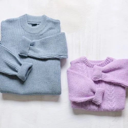 Blue and purple folded knit sweaters