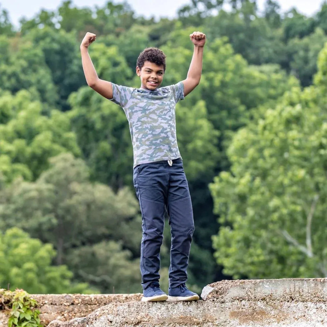 boy standing and smiling